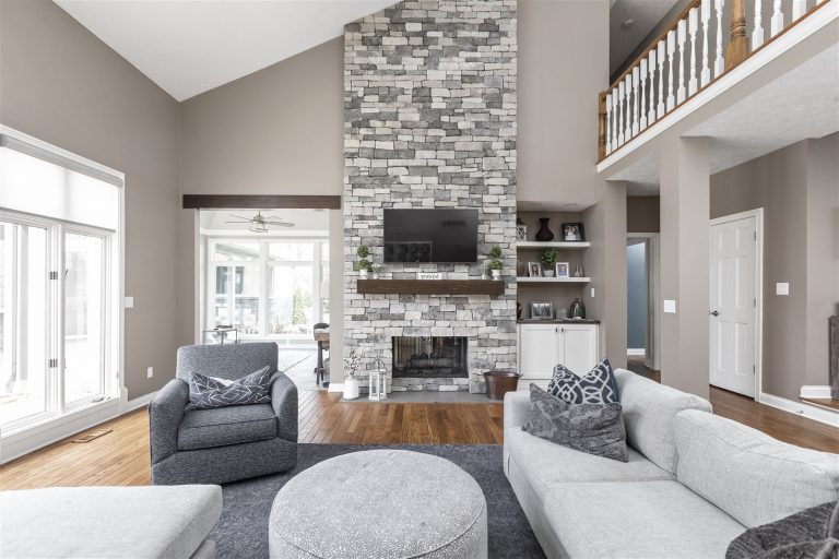 remodel whole house living room with stacked stone fireplace