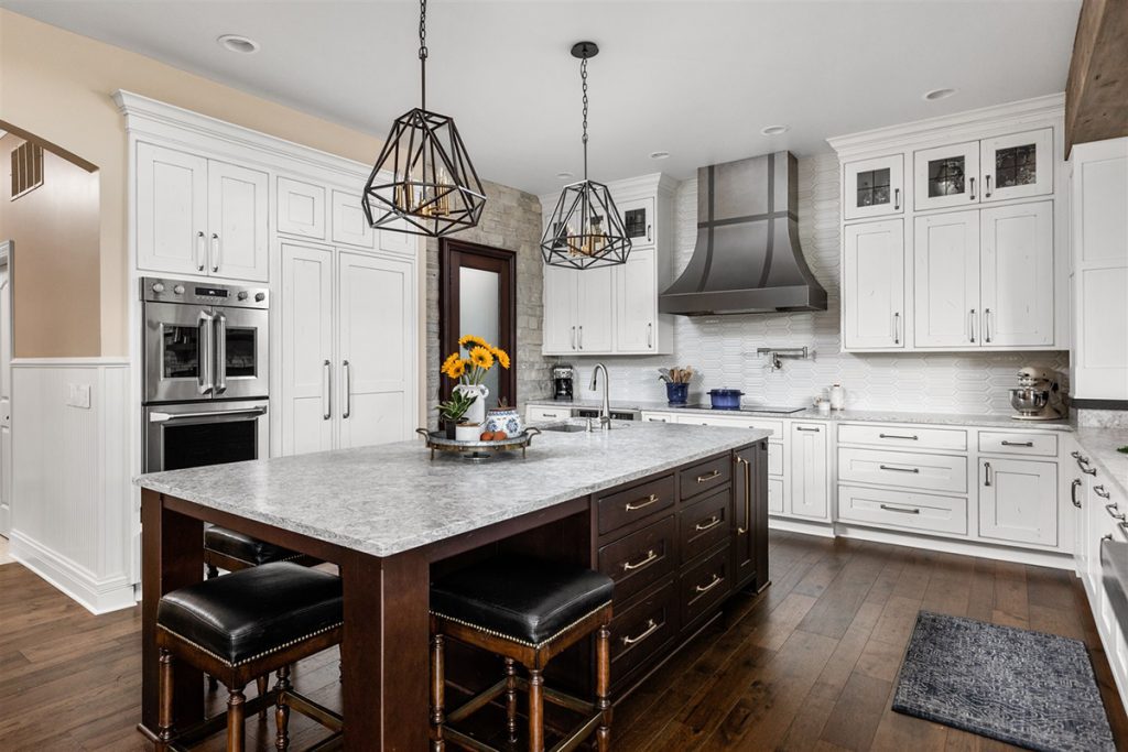 custom kitchen island ideas should include a durable countertop and added storage and seating