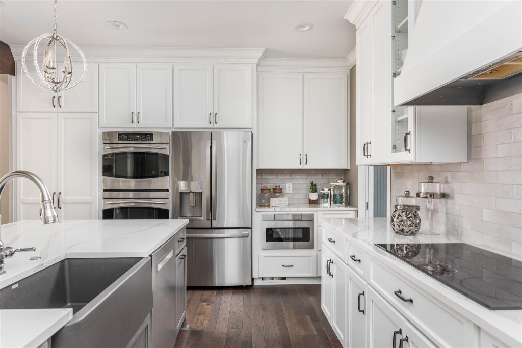 a clean floorplan with lots of room for movement is key to doing the open concept kitchen right