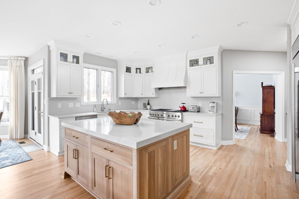 Timeless Kitchens with white countertop and white oak kitchen cabinets