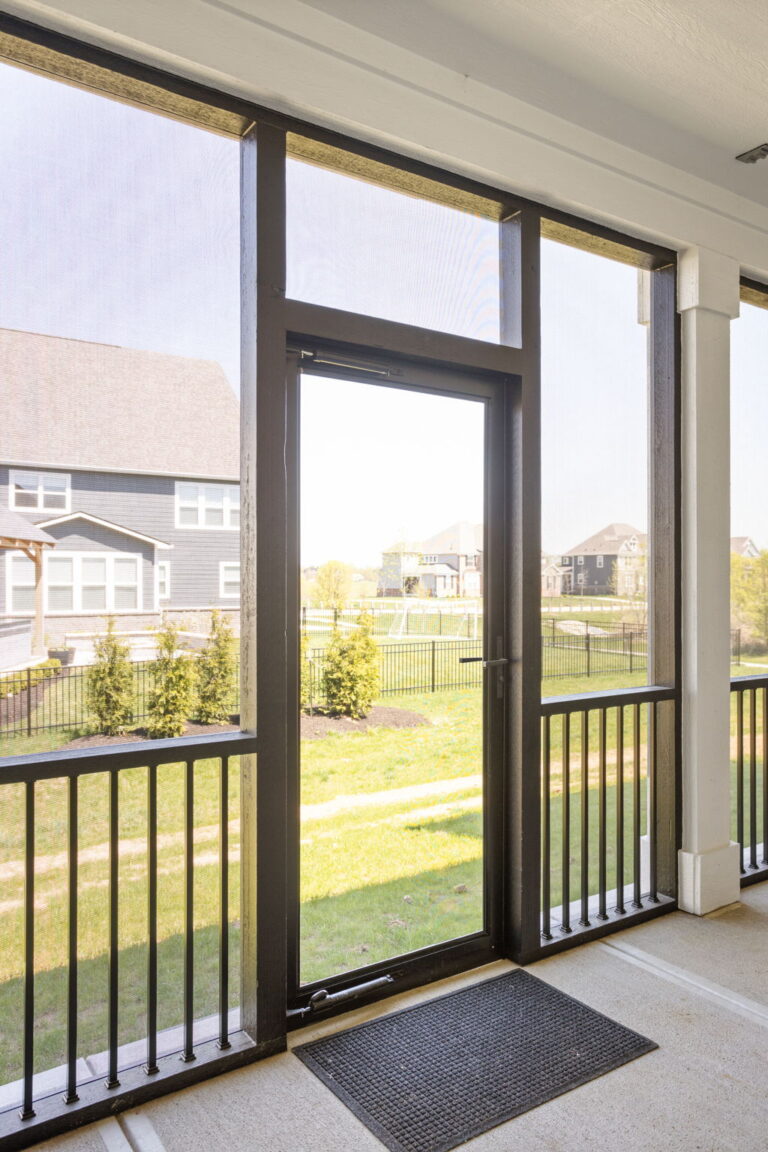 Larson Signature Collection screen door on porch addition by home addition contractor Carmel IN.
