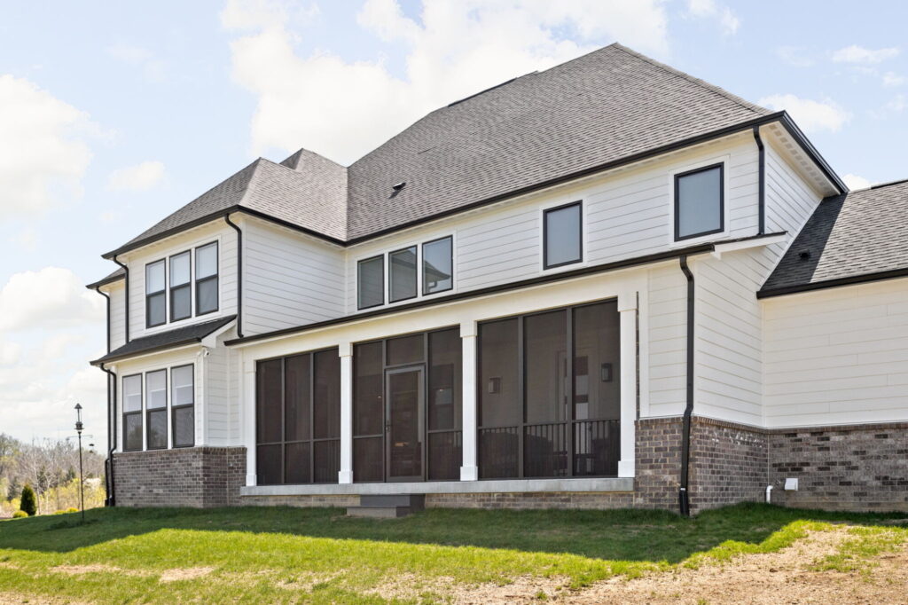 Full exterior view of screened-in porch addition built by home addition contractor Carmel IN.