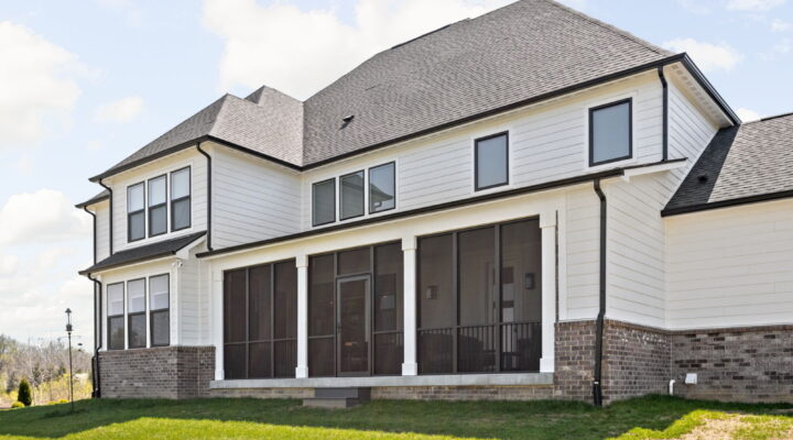 Full exterior view of screened-in porch addition built by home addition contractor Carmel IN.