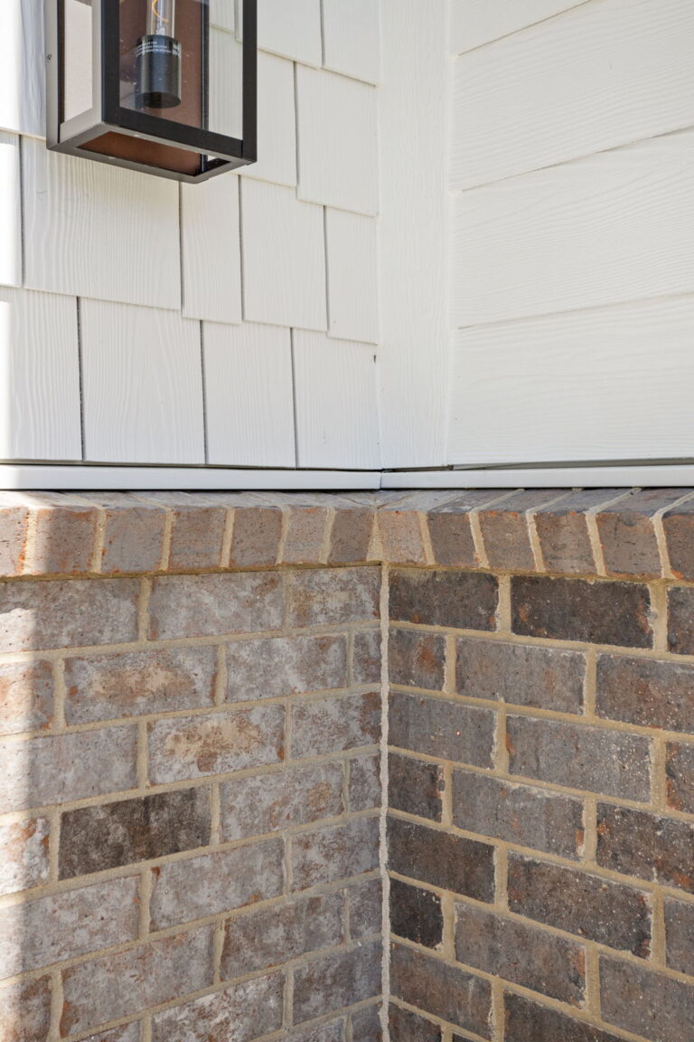 BrickCraft Coral Blend masonry detail on garage addition by home addition contractor Carmel IN.