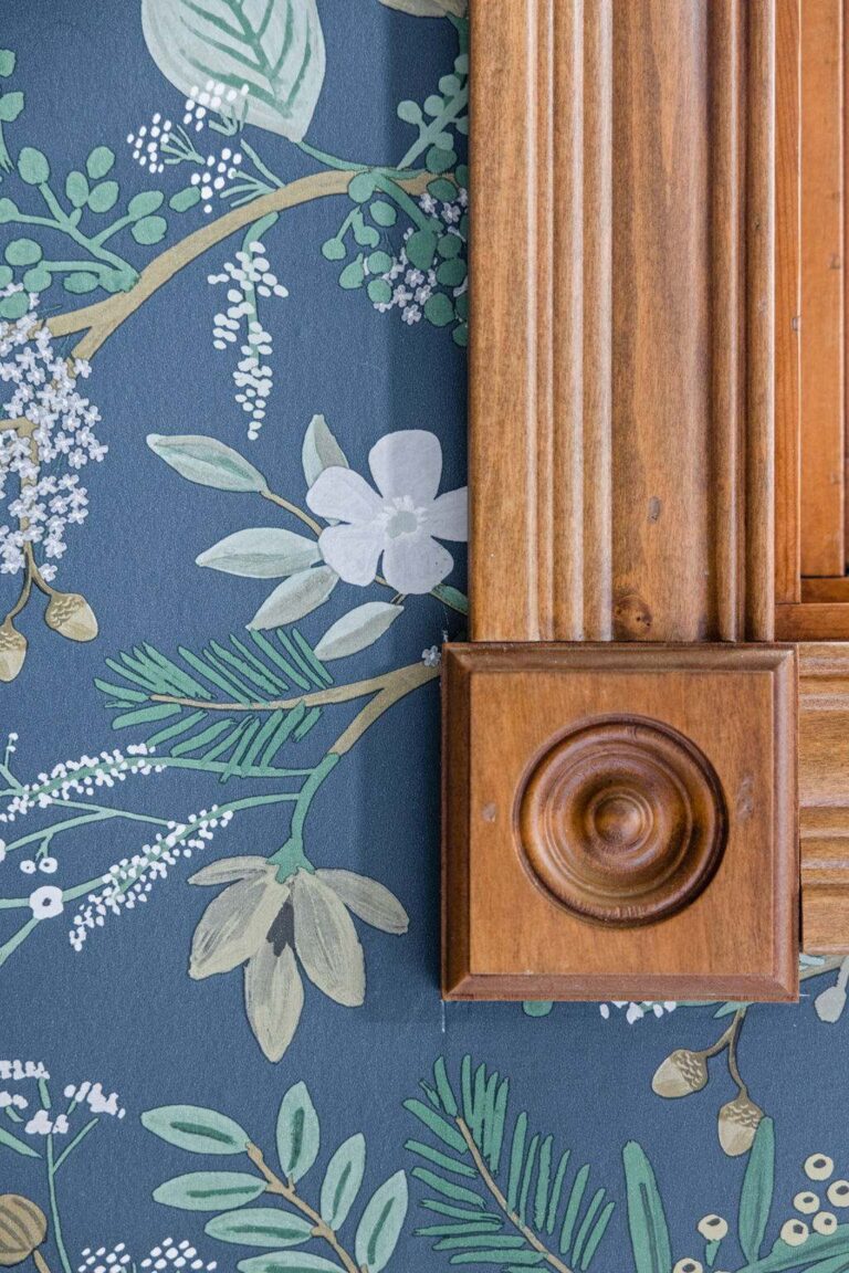 Decorative wood trim detail paired with botanical wallpaper accent in a Lebanon Indiana kitchen renovation.