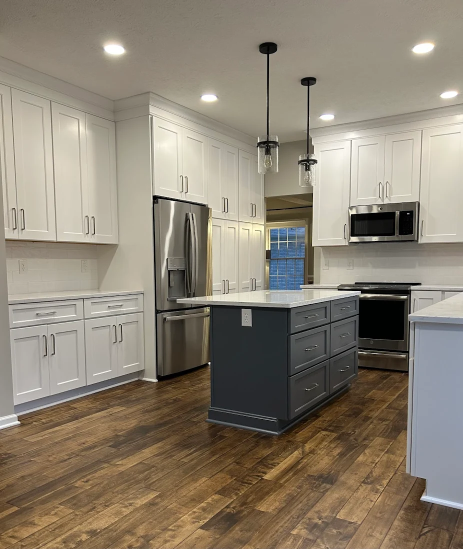 zionsville indiana kitchen remodel review photo by Jason of a white kitchen and navy blue kitchen island
