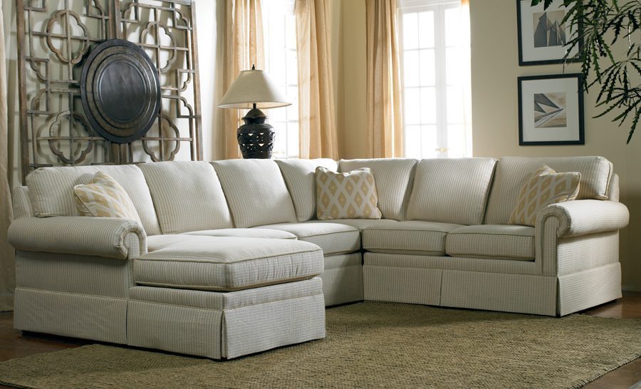 A spacious carmel indiana home addition featuring adaptable Sherrill Furniture sectionals and warm natural lighting for flexible family living