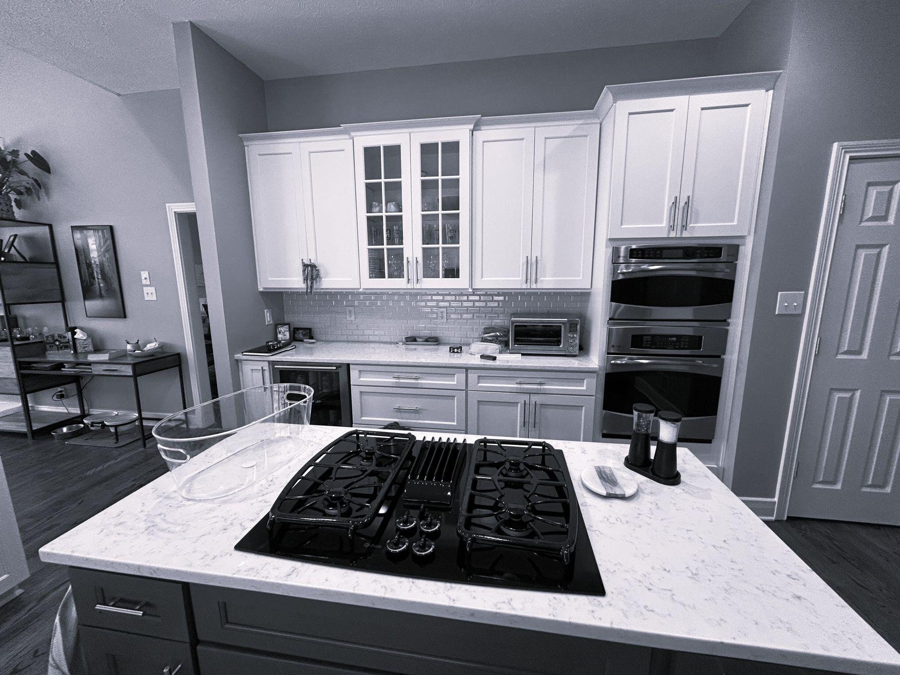 Before photo of the Fishers kitchen appliance wall before new cabinetry, Bosch appliances, and range wall updates.